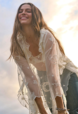  photographed against a bright sunset sky.